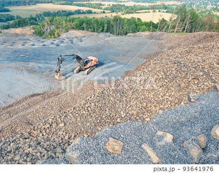 Heavy machinery in the clinkstone or phonolite mining quarry 93641976