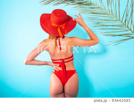 Woman with red swimsuit ready for the summer Woman with red swimsuit ready for the summer 93642085