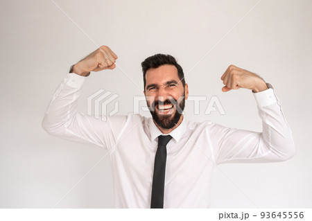 Cheerful bearded man in studio 93645556