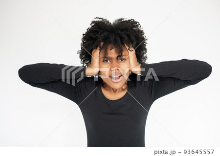 Portrait of depressed African American woman looking at camera 93645557
