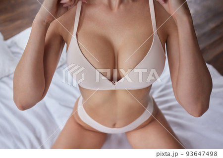Attractive young woman in white underwear - Stock Photo [62384499] -  PIXTA