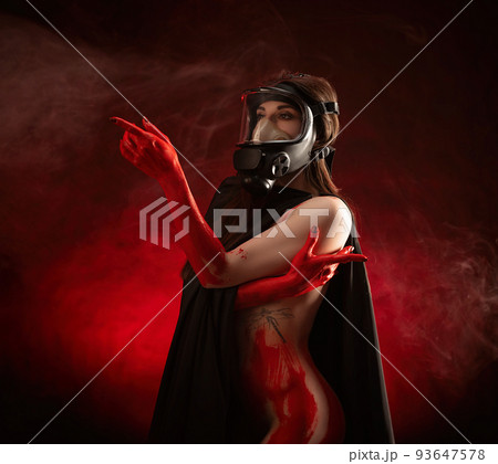 naked girl in a gas mask with a bloody body in a red haze naked girl in a gas mask with a bloody body in a red haze 93647578