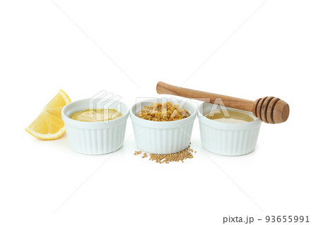 Bowls with sauces isolated on white background Bowls with sauces isolated on white background 93655991