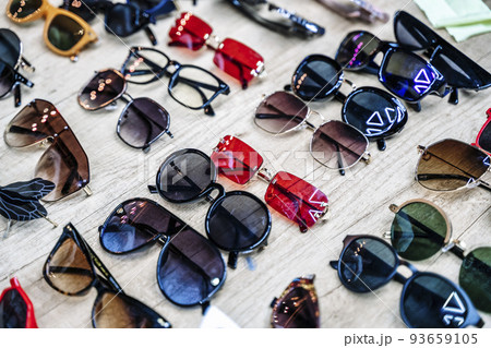 Vintage sunglasses on the counter of a flea market. Retro, fashion, vintage concept. 93659105