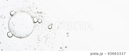 The texture of a cosmetic serum with bubbles in closeup. Copy space The texture of a cosmetic serum with bubbles in closeup. Copy space 93663337