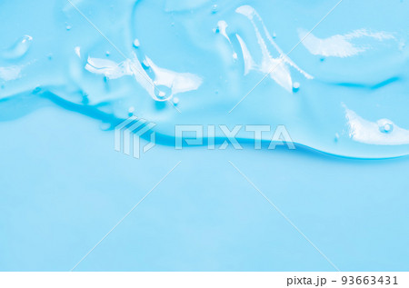 The texture of a liquid gel, cosmetic serum or cleansing lotion from acne. Copy space The texture of a liquid gel, cosmetic serum or cleansing lotion from acne. Copy space 93663431