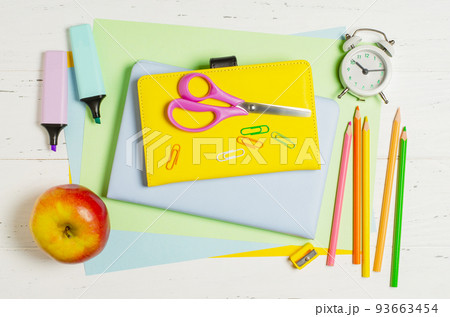 Children's accessories for study, creativity and office supplies on a white wooden background. Back to school concept 93663454