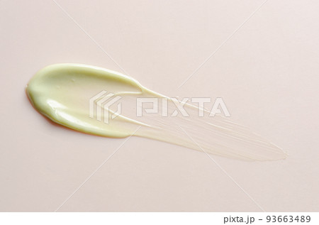 A sample of moisturizer on a pink background. Cosmetic product for the skin. A sample of moisturizer on a pink background. Cosmetic product for the skin. 93663489