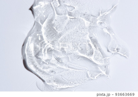 Transparent cosmetic texture. Skin serum or washing gel. Macrophotography. Transparent cosmetic texture. Skin serum or washing gel. Macrophotography. 93663669