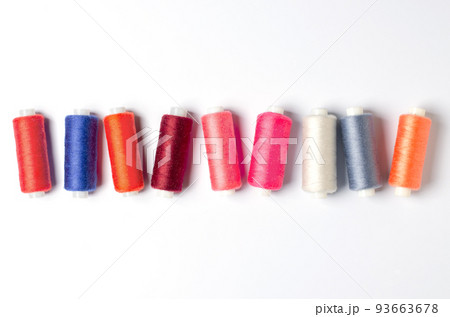 Accessories for sewing on a white background. Closeup. Copy space Accessories for sewing on a white background. Closeup. Copy space 93663678