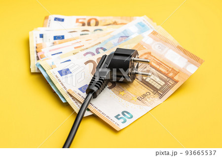 Electric plug and euro money. Concept of increasing electricity prices. 93665537