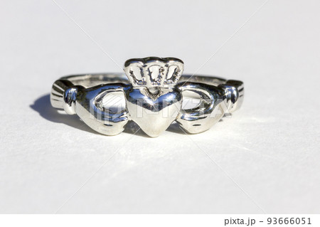 Claddagh ring. Traditional Irish ring in shape of two hands holding a heart shaped. Claddagh ring. Traditional Irish ring in shape of two hands holding a heart shaped. 93666051
