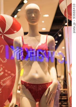 Display window with mannequins in shop. Sexy underwear on mannequin in retail. Female mannequins in the big mall. 93666410