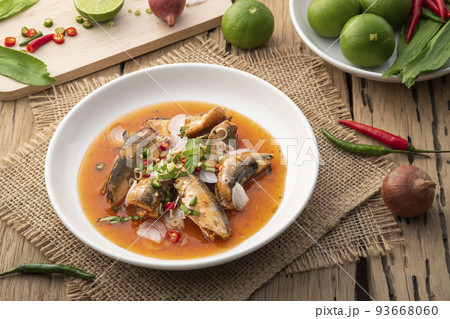 Spicy Canned Sardine Salad.Mixed salad with sliced lemon grass, fish sauce, lime juice and paprika Spicy Canned Sardine Salad.Mixed salad with sliced lemon grass, fish sauce, lime juice and paprika 93668060