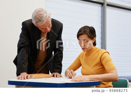 People discussing material at lecture People discussing material at lecture 93668275