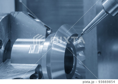 The multi-tasking CNC machine  cutting the differential gear part. 93669854