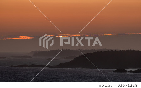 Waves on the Pacific Ocean on a rocky beach. West Coast. Sunny Summer Sunset. Waves on the Pacific Ocean on a rocky beach. West Coast. Sunny Summer Sunset. 93671228
