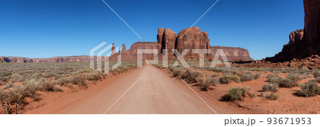 Dirt Road in Desert Rocky Mountain American Landscape. 93671953