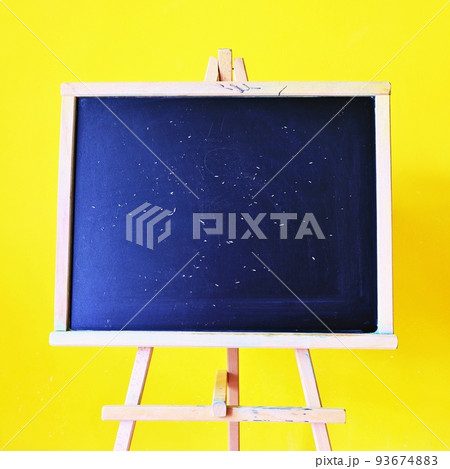 Blackboard - back to school. Concept for education and school on yellow background. Blackboard - back to school. Concept for education and school on yellow background. 93674883
