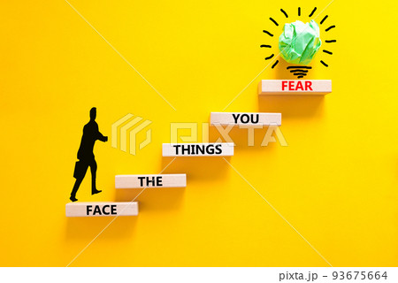 Face the things you fear symbol. Concept words Face the things you fear on wooden blocks on a beautiful yellow background. Businessman icon. Business and face the things you fear concept. Copy space. Face the things you fear symbol. Concept words Face the things you fear on wooden blocks on a beautiful yellow background. Businessman icon. Business and face the things you fear concept. Copy space. 93675664