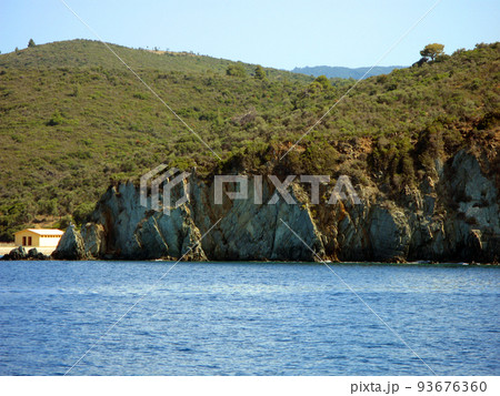 Panoramic view of the mediterranean coast, Greece, rocks, pine trees on the shore, beautiful landscape Panoramic view of the mediterranean coast, Greece, rocks, pine trees on the shore, beautiful landscape 93676360