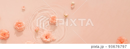 Water beauty background. Natural pattern with pink roses on surface of transparent water close-up Water beauty background. Natural pattern with pink roses on surface of transparent water close-up 93676797