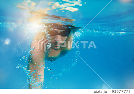 Sporty man swims fast in the sea 93677772