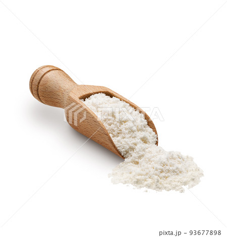Wooden scoop full of coconut flour isolated on white background Wooden scoop full of coconut flour isolated on white background 93677898