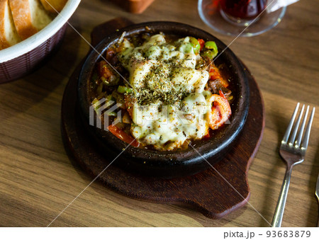 Beef stewed with sweet peppers, tomatoes and onions Beef stewed with sweet peppers, tomatoes and onions 93683879