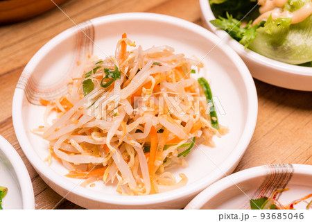 Korean pickle or Pickled radish vegetables and seasoning on bowl Korean pickle or Pickled radish vegetables and seasoning on bowl 93685046