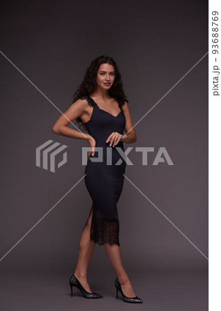 Full length portrait of young feminine woman in elegant dress and shoes 93688769
