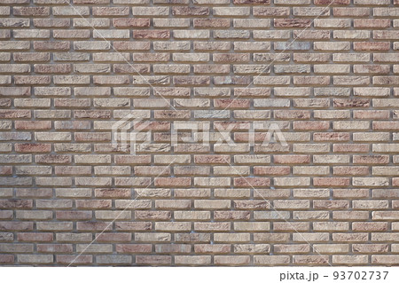 Background. Brick wall. Clinker clay brickwork. red brick wall background, wide panorama of masonry. Brown brick wall texture background Background. Brick wall. Clinker clay brickwork. red brick wall background, wide panorama of masonry. Brown brick wall texture background 93702737