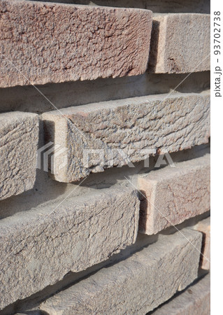 Brown brick wall perspective design, concept background Brick wall. Clinker clay brickwork. Brown brick wall perspective design, concept background Brick wall. Clinker clay brickwork. 93702738