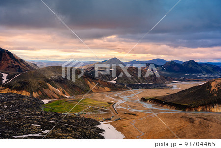 Scenery from Blahnjukur trail with volcanic mountain and lava field in Icelandic highlands on Landmannalaugar at Iceland 93704465