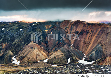 Scenery from Blahnjukur trail with volcanic mountain and lava field in Icelandic highlands on Landmannalaugar at Iceland 93704466