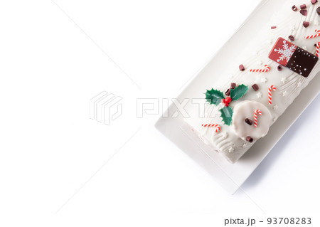 White chocolate yule log cake 93708283