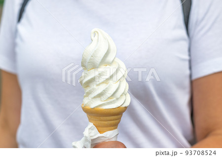 Soft vanilla ice cream with chocolate stick 93708524