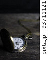 Vintage pocket watch and hour glass or sand timer, symbols of time with copy space 93711121
