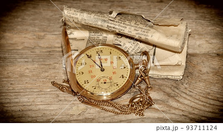 Vintage pocket watch and hour glass or sand timer, symbols of time with copy space 93711124