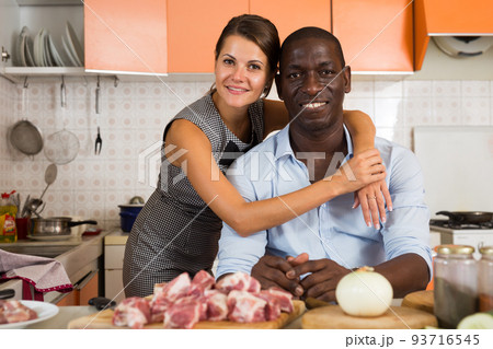 Male and female making dinner Male and female making dinner 93716545