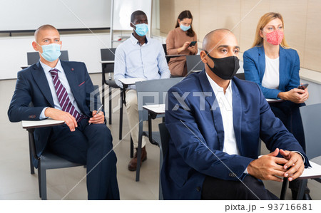 international group of businessmen at world training courses during pandemic international group of businessmen at world training courses during pandemic 93716681