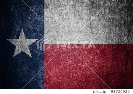 Closeup of grunge Texas flag. Dirty Texas flag on a metal surface Closeup of grunge Texas flag. Dirty Texas flag on a metal surface 93720929