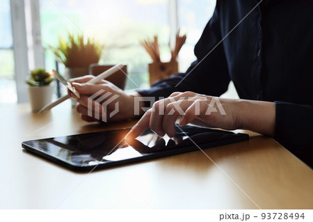 Online payment, Young Women's using tablet and hand holding cradit card for online shopping 93728494