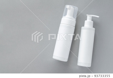 Mock-up of white plastic cosmetics bottles with skincare 93733355