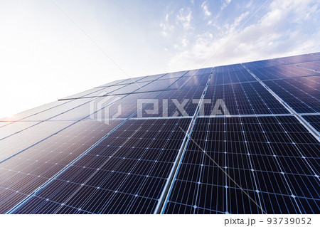 Solar panel photo close up on blue sky background, renewable energy eco 93739052