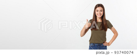 Closeup portrait of a beautiful young woman showing thumbs up sign. Isolate over white background. Closeup portrait of a beautiful young woman showing thumbs up sign. Isolate over white background. 93740074