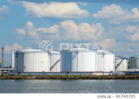 Petrochemical refinery product tank farm at oil terminal for commercial trade fuel transport Petrochemical refinery product tank farm at oil terminal for commercial trade fuel transport 93740705