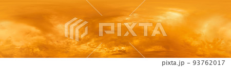 Burning golden dramatic overcast sunset sky panorama. Hdr seamless spherical equirectangular 360 panorama. Sky dome or zenith for 3D visualization and sky replacement for aerial drone 360 panoramas. 93762017