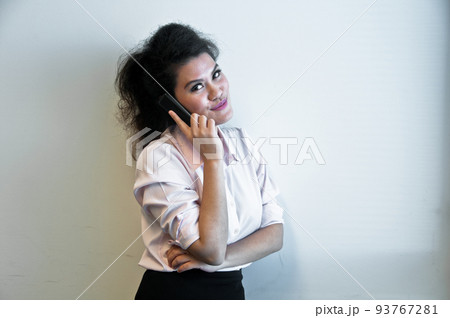 Business woman make a call on white background Business woman make a call on white background 93767281