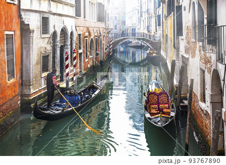 Romantic Venetian canals and gondolas. Venice, Italy 93767890